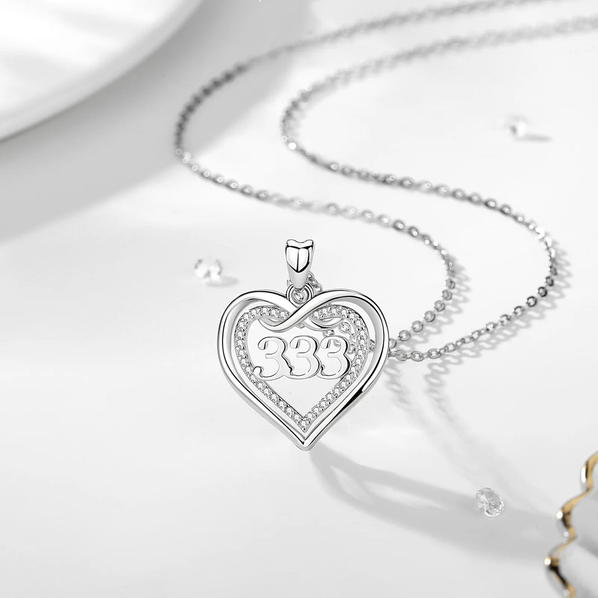 333 open heart necklace with an infinity loop above the centered repeating number