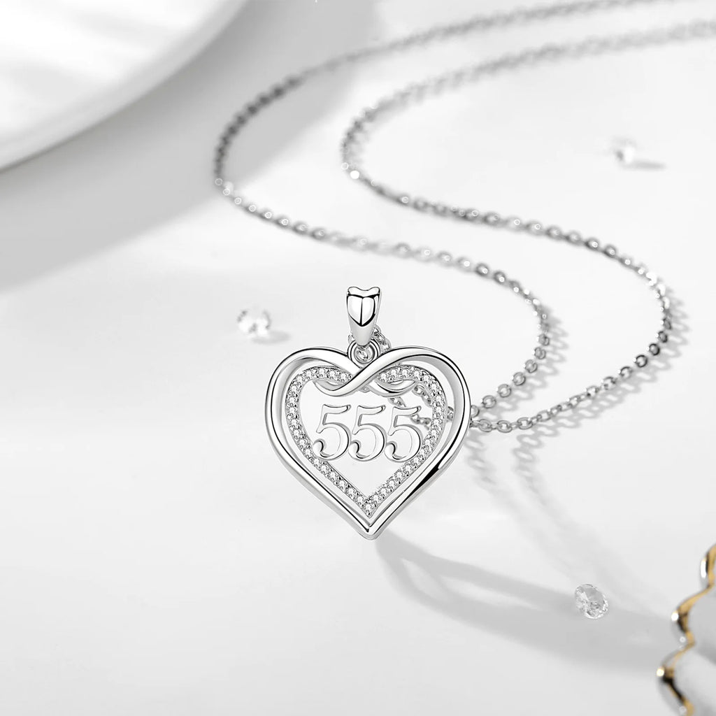 555 angel number heart necklace with polished silver outline and clear CZ stone accents