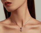 Eye of Horus ankh necklace worn on the neck with the small pendant centered below the collarbone