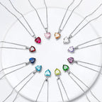 Faceted heart necklace color options arranged in a circle on a white background