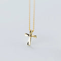 Gold-tone 925 sterling silver cross pendant with polished flared arms and a fine link chain