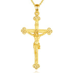 Gold-plated sterling silver crucifix hanging from a gold-colored link chain on a white background