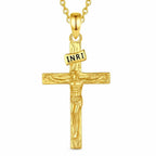 Gold crucifix necklace with INRI plaque and raised Christ figure on a white background