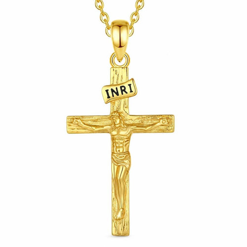 Gold crucifix necklace with INRI plaque and raised Christ figure on a white background