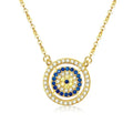 Gold-tone double halo evil eye necklace with clear outer stones, deep-blue inner ring and mixed center