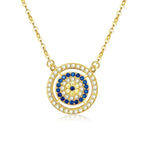 Gold-tone double halo evil eye necklace with clear outer stones, deep-blue inner ring and mixed center