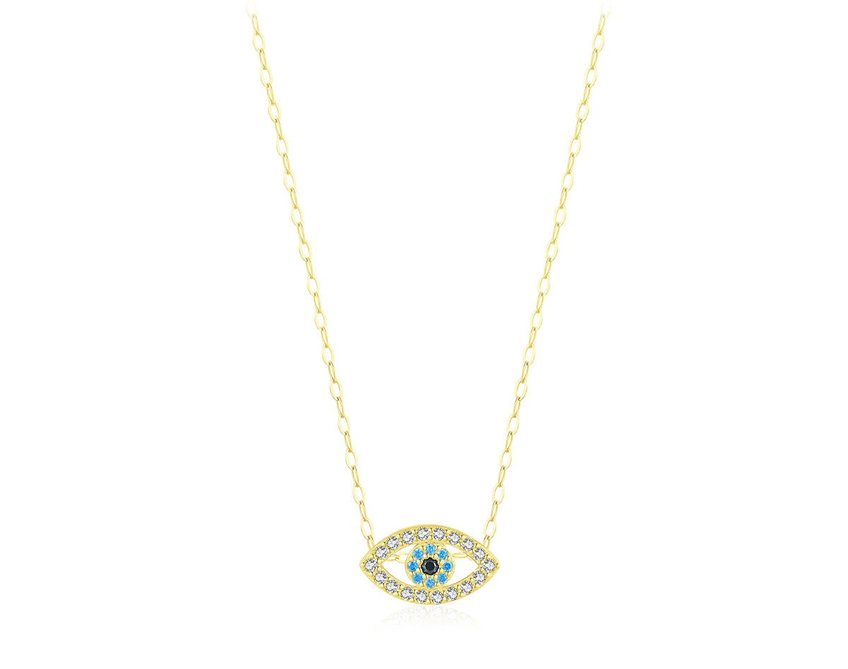 Gold-tone small evil eye necklace with clear outline stones and blue and black center stones on a white background