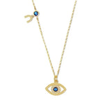 Gold evil eye necklace with blue stone and crescent charm in gold-tone 925 sterling silver on white