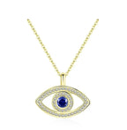 Halo evil eye necklace with blue stone and sparkling outline in a gold-tone finish on white