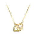 Gold-tone interlocking heart necklace with a clear CZ stone row on a white background