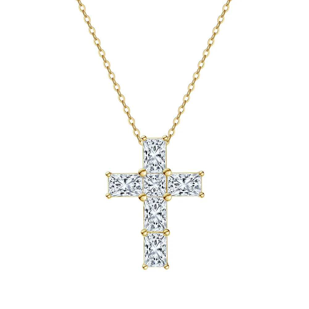 Gold-tone moissanite cross necklace with six clear stones and corner prongs on a white background
