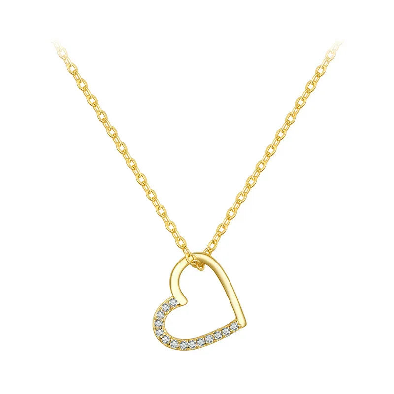 Gold-plated 925 sterling silver open heart necklace with clear CZ stones on a white background