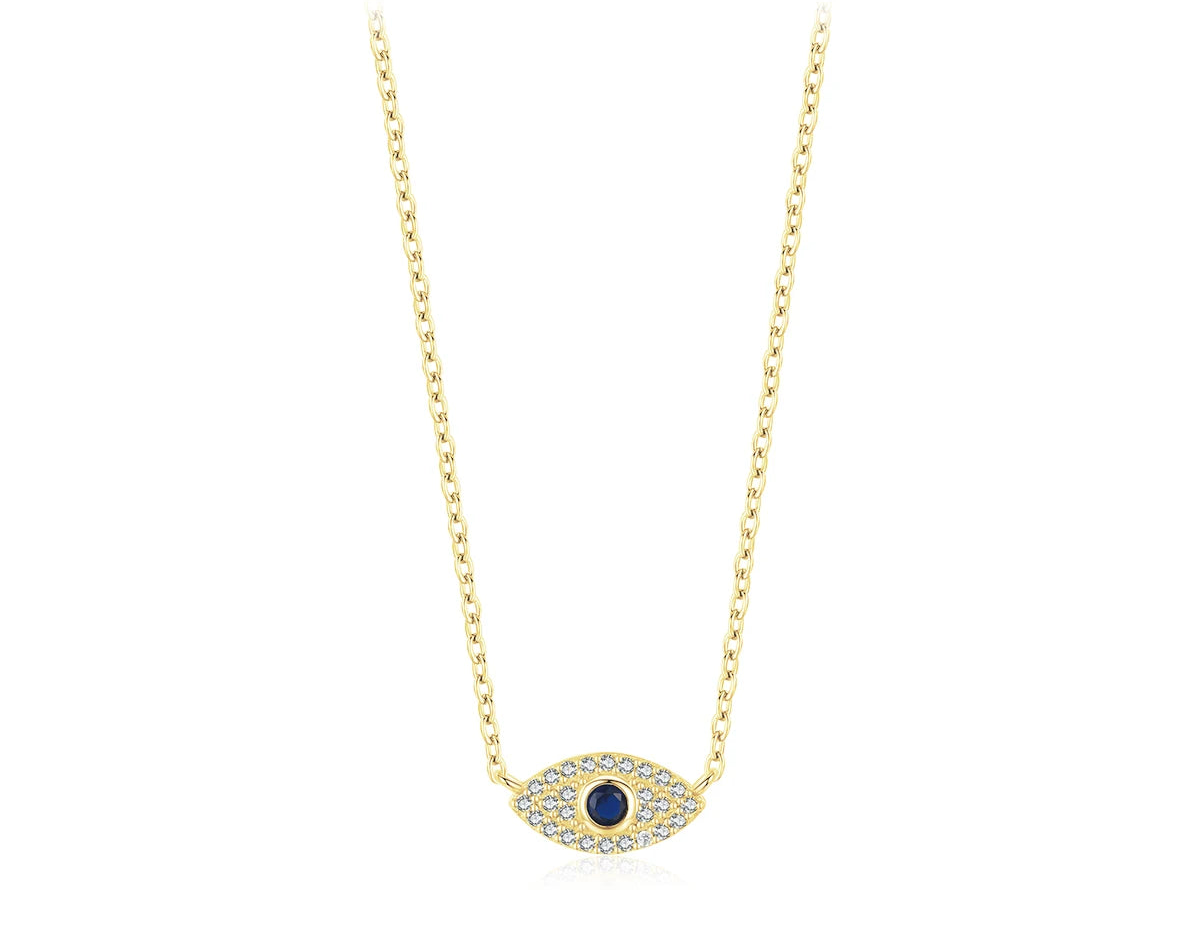 Gold-tone sideways evil eye necklace with clear crystal stones and a dark blue cubic zirconia center
