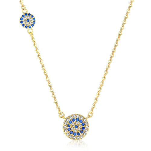 Gold-tone asymmetric evil eye necklace with blue and clear cubic zirconia round medallions on white