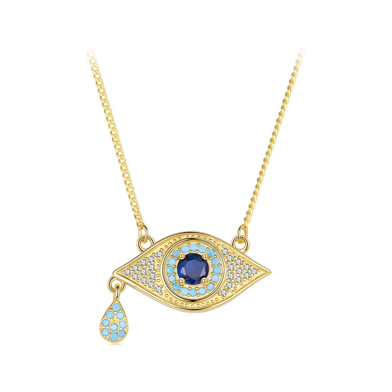 Gold-tone evil eye necklace with a dark-blue center, light-blue stone ring, and teardrop charm on white