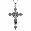 Gothic crucifix necklace in 925 sterling silver with raised Jesus figure, rays, and floral cross ends