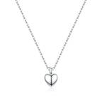 Front view of the polished puffy heart necklace with center groove on a white background
