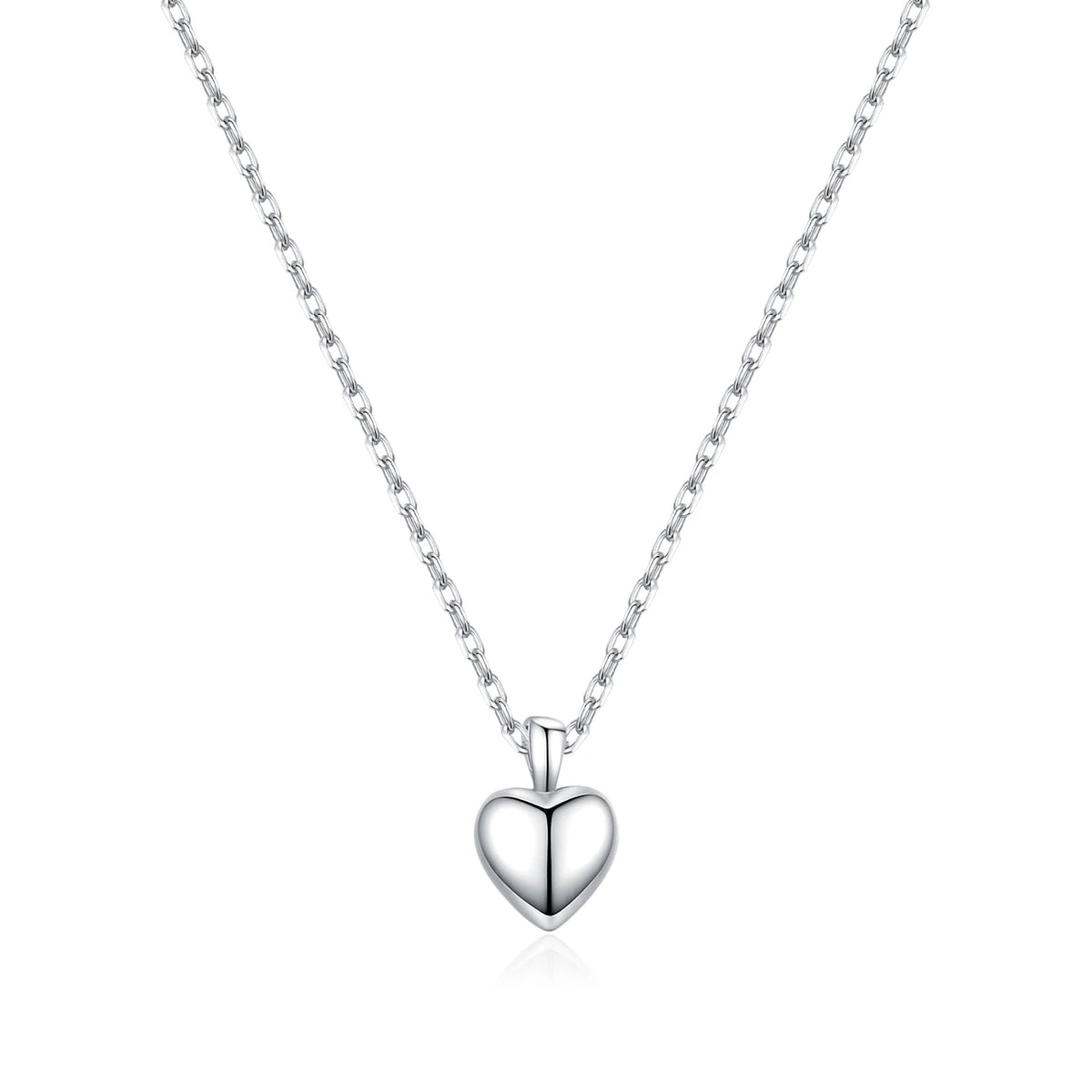 Front view of the polished puffy heart necklace with center groove on a white background
