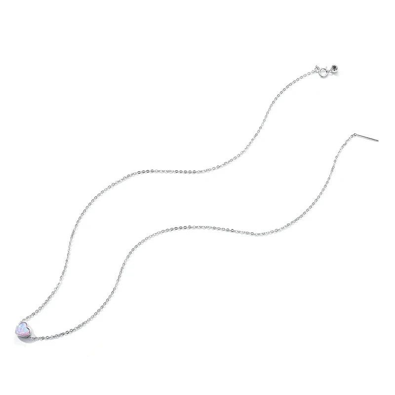 Platinum-plated 925 sterling silver heart necklace laid out to show the fine chain, clasp and opal-look pendant