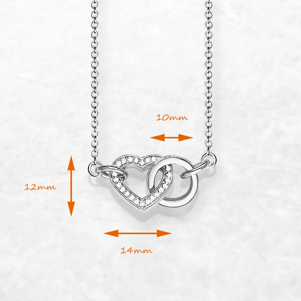 Dimension guide for the heart centerpiece, 0.47 x 0.55 in (1.2 x 1.4 cm)
