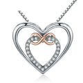 Infinity heart necklace with a polished silver-colored outer heart, CZ inner heart, and rose-gold-colored loop