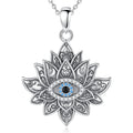 Lotus evil eye necklace in 925 sterling silver with blue, black, and clear CZ stones on white