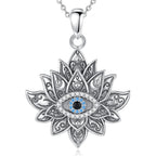 Lotus evil eye necklace in 925 sterling silver with blue, black, and clear CZ stones on white
