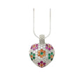Multicolor heart necklace with clear and pink, green, and orange CZ flower clusters on a white background