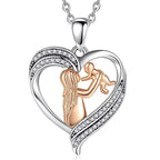 New mom heart necklace with a rose-gold-colored mother lifting her baby inside a CZ-set silver heart