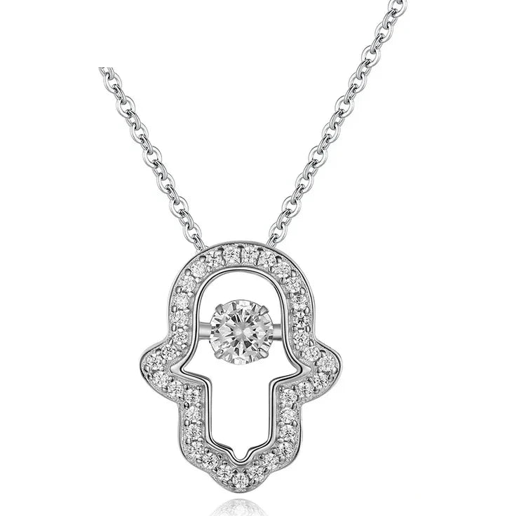 Open hamsa hand necklace in 925 sterling silver with clear CZ stones and a round center stone on white