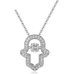 Open hamsa hand necklace in 925 sterling silver with clear CZ stones and a round center stone on white