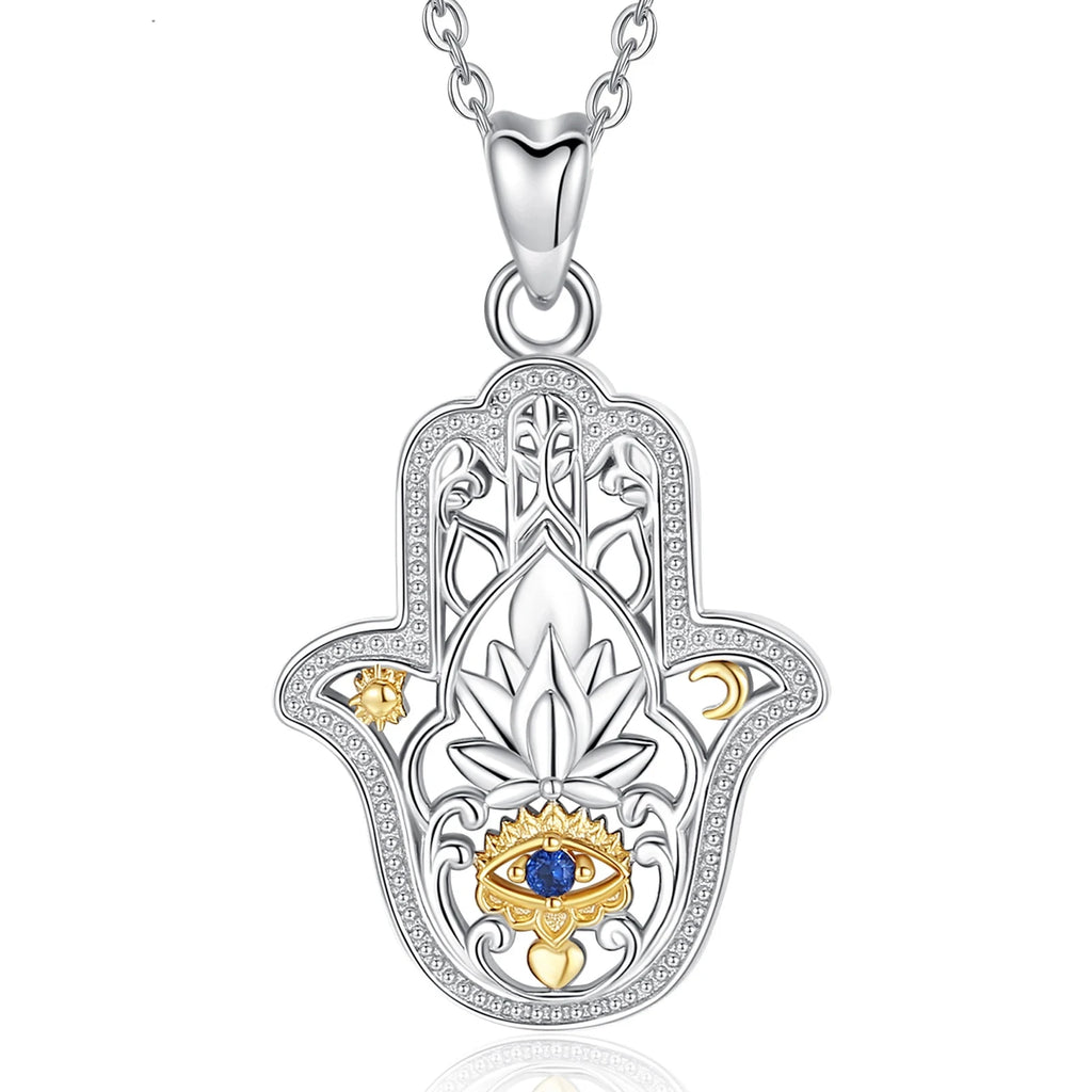 Ornate hamsa hand necklace in 925 sterling silver with a blue eye, lotus, sun and crescent on white