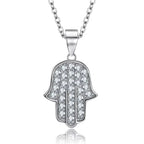 Pave Hamsa hand necklace in 925 sterling silver with clear CZ rows and a polished rim on white background
