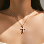 925 sterling silver pearl cross necklace worn at the collarbone on a fine oval-link chain