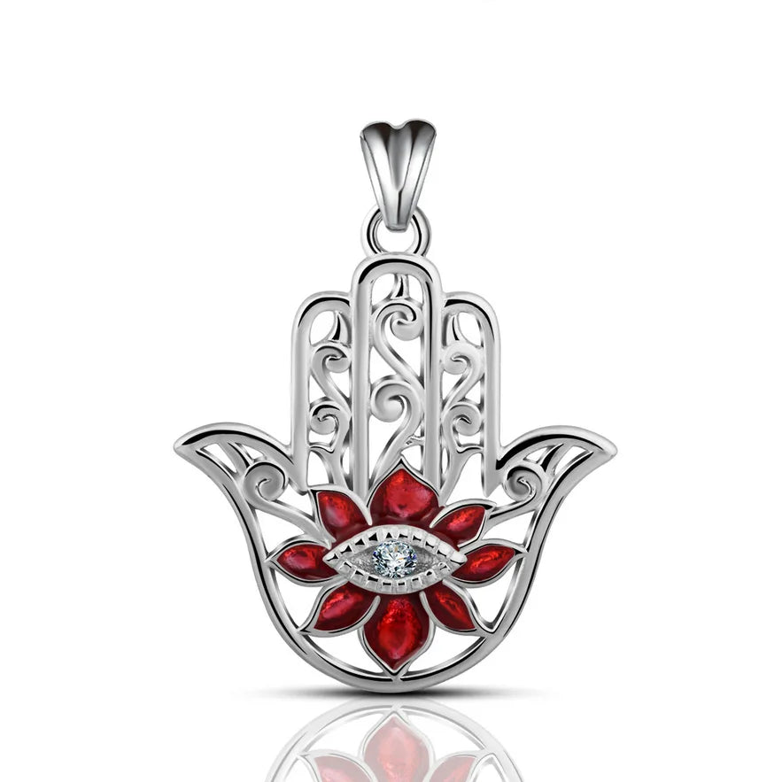 Red flower hamsa pendant with an eight-petal flower and clear stone eye on white