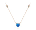 Rose gold-tone blue heart necklace with two clear crystals set along the chain