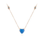 Rose gold-tone blue heart necklace with two clear crystals set along the chain