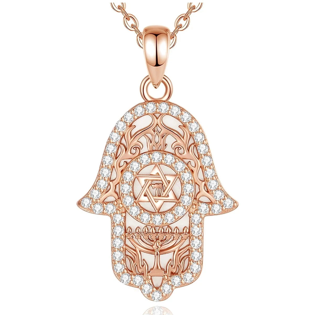 Rose gold hamsa hand necklace with Star of David, filigree and clear CZ stones on white