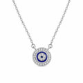 Round evil eye necklace in 925 sterling silver with blue concentric rings and clear cubic zirconia on white