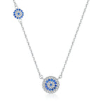 Silver-tone necklace with a centered blue evil eye medallion and smaller matching eye along the chain