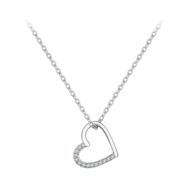 925 sterling silver asymmetrical open heart necklace with clear CZ stones on a white background