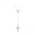 Y lariat silver cross necklace with a CZ heart connector and pointed cross on a white background