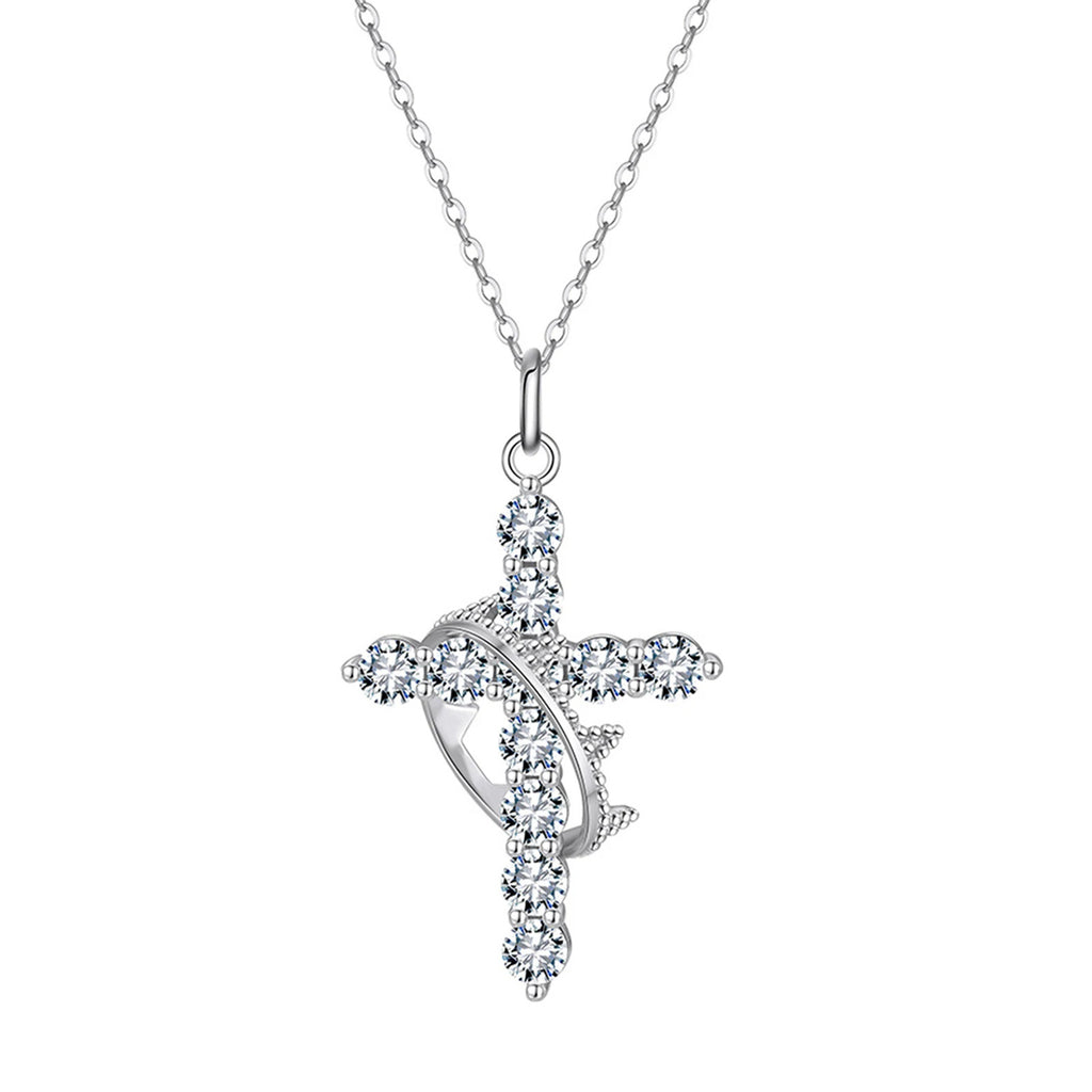 Silver-tone crown of thorns cross necklace with clear cubic zirconia stones on a white background