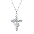 Silver-tone crown of thorns cross necklace with clear cubic zirconia stones on a white background