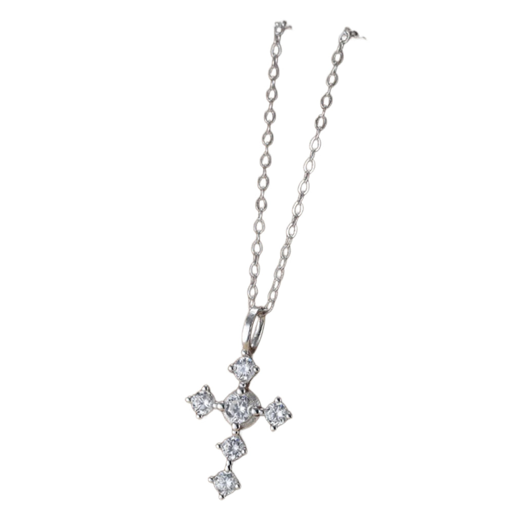 Silver-tone cross necklace with six clear cubic zirconia stones and a larger center stone on a white background