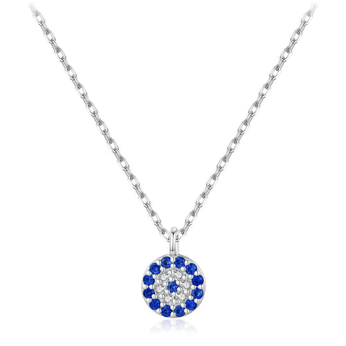 Silver-tone crystal evil eye necklace with a round pendant of blue and clear stones on a white background