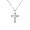 Curved silver cross necklace with clear CZ stones and raised center ridge on white