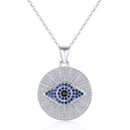 Medallion evil eye necklace in 925 sterling silver with blue and black CZ center on white