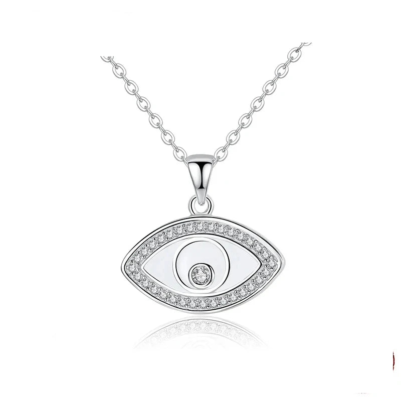 Minimalist evil eye necklace in silver-tone 925 sterling silver with clear CZ border stones on white