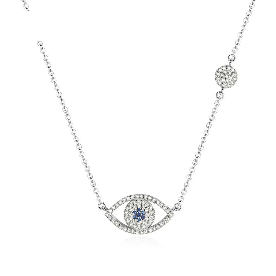 Horizontal evil eye necklace with blue CZ center, clear CZ outline, and round chain station on white